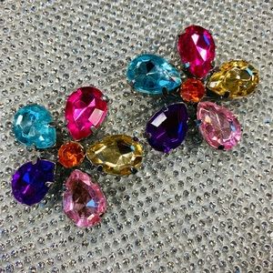 Colorful flower pins with jewels. Safety pins.